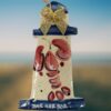 Red-Lobster-on-Blue-Lighthouse-with-Gold-Bow-Bar-Harbor-Ceramic-Ornament_Christmas_Vacation_Shop_Bar_Harbor_Maine