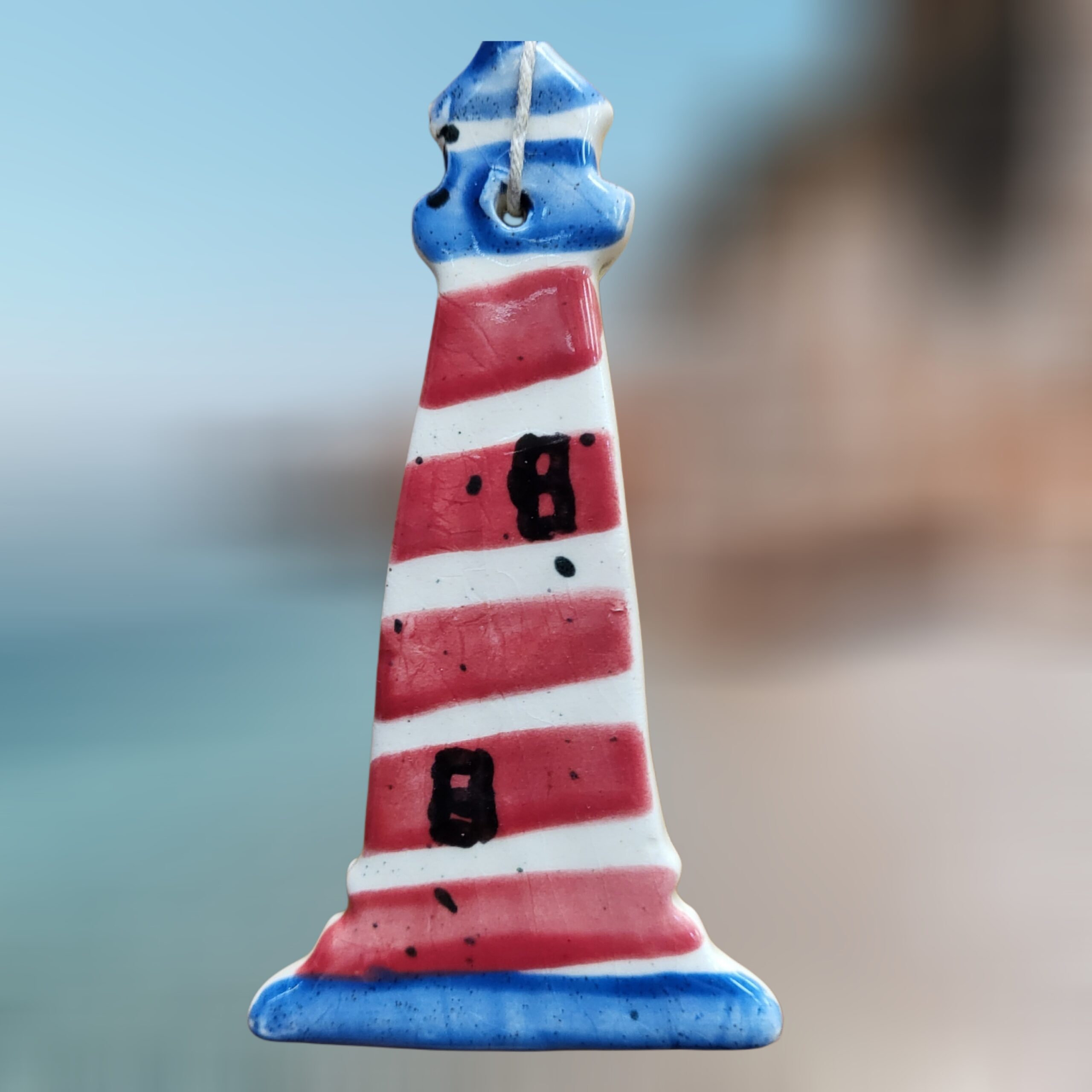Red-and-White-Striped-Lighthouse-Tapered-Ceramic-Ornament_Christmas_Vacation_Shop_Bar_Harbor_Maine